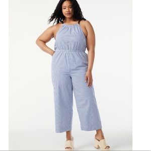 Plus size fee assembly tie neck jumpsuit